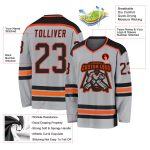 Custom gray, black and orange hockey jersey, detail of the printed panel