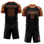 Custom black and orange soccer jersey, back view