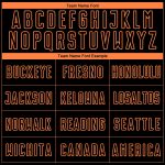 Custom black and orange soccer jersey, flat lay
