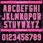 Custom black, pink and white softball jersey, flat lay
