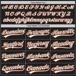 Custom black, white and orange pinstripe baseball jersey, side view