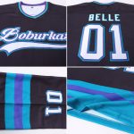 Custom teal, black and white hockey jersey, flat lay