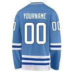 Custom light blue, white and royal hockey jersey, detail of the printed panel