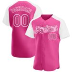 Custom pink and white raglan sleeve baseball jersey