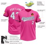 Custom pink, white and navy softball jersey, detail of the printed panel
