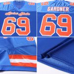 Custom orange and white mesh football jersey, flat lay